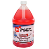 A large, clear plastic jug of bright red, premium machine detergent labeled “Marston Chemical Premium Machine Liquid Detergent”—made in USA, with a red and white label featuring a dishwasher graphic, product details, and contact information.