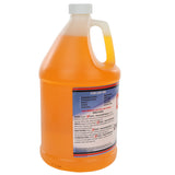 A large, translucent orange plastic gallon jug with a white screw cap. The jug has a handle and a blue and white label listing uses such as ovens, grills, and countertops. The orange liquid inside is a powerful commercial oven cleaner. Directions appear on the label.