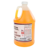 A one-gallon plastic jug of yellow-orange commercial oven cleaner with a handle and white cap. The label includes usage instructions, safety warnings, an American flag, and notes it’s biodegradable and made by Marston Chemical.