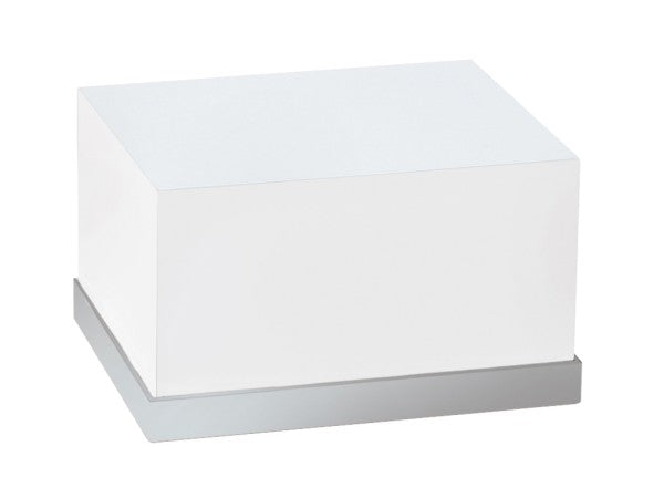 A white rectangular box with smooth edges sits on a flat, stainless steel base. This minimalist Luxe Display Riser is unmarked and photographed against a plain white background.