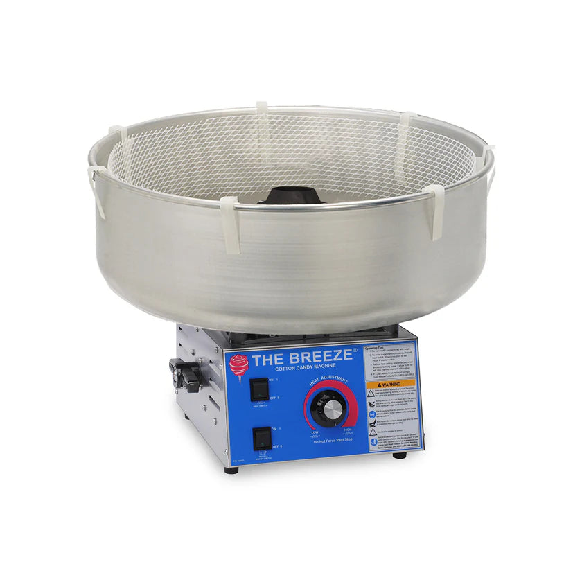 A commercial Gold Medal Products The Breeze cotton candy machine with a large metal spinning bowl, protective white mesh rim, and blue control panel with knob, switches, and warning labels.