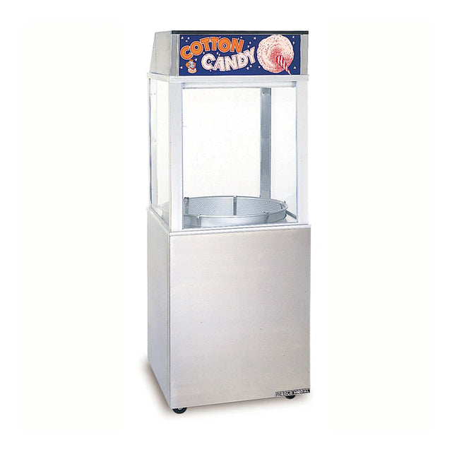 A commercial cotton candy machine by Gold Medal Products with a clear enclosure and stainless steel base. The top features a sign reading “Cotton Candy” in bold, colorful letters and a picture of pink cotton candy on a stick.