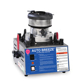 A Gold Medal Products Candy Floss Machine labeled “AUTO BREEZE” features a blue control panel, switches, warning labels, red handles, and a large metal spinning head on top. Built with metal sides, it’s designed for professional use.