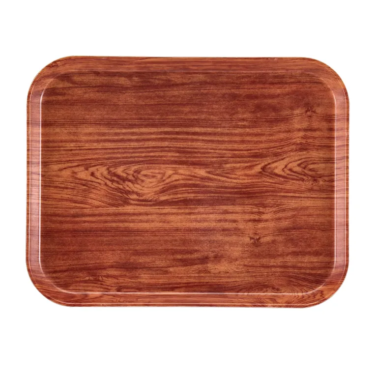 A Camtray rectangular serving tray with rounded corners, featuring a glossy finish and a wood grain pattern in warm brown tones. This high-impact fiberglass tray is empty and photographed from above on a white background.
