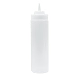 A clear, empty 24 oz squeeze bottle with a pointed nozzle tip and screw-on cap stands upright against a plain white background. This cylindrical, translucent WideMouth Squeeze Bottle is typically used for condiments or sauces and is dishwasher safe.