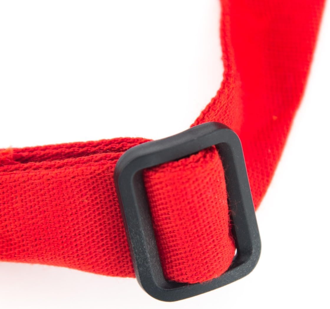 Close-up of a red fabric strap with an adjustable neck threaded through a rectangular black plastic buckle, set against a white background. The texture is visible, highlighting the quality details of this chef approved bib apron.