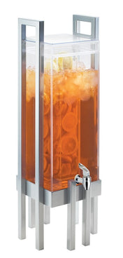 A tall, rectangular Cal-Mil beverage dispenser with a silver metal frame, filled with iced tea and ice cubes. Lemon slices float on top of the 3 gallon container, which features a clear lid and a metal spigot near the bottom for pouring drinks.