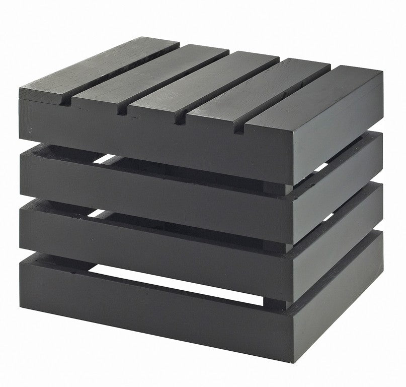A black wooden side table with a modern, minimalist design. Inspired by a Midnight Bamboo Crate Riser, it features four thick horizontal slats and stacked gaps for an open look. The flat surface and base create a sleek, square shape.