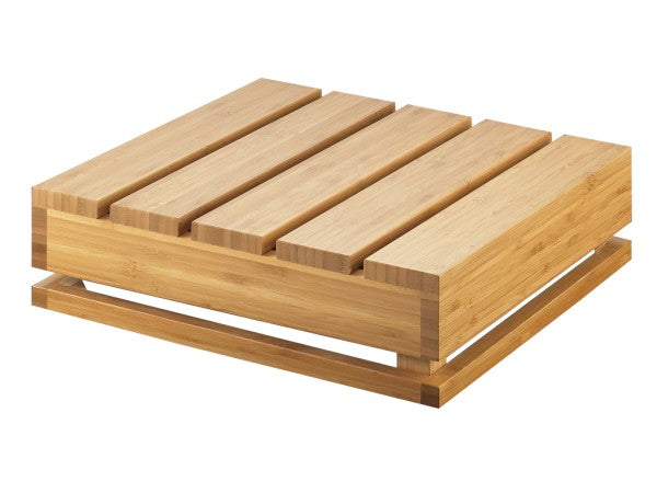 A rectangular bamboo soap dish with four evenly spaced slats on top and an open base frame, allowing water to drain and air to circulate. The wood has a smooth, light finish, giving it a natural and minimalist look—great for shelving or crate riser use.