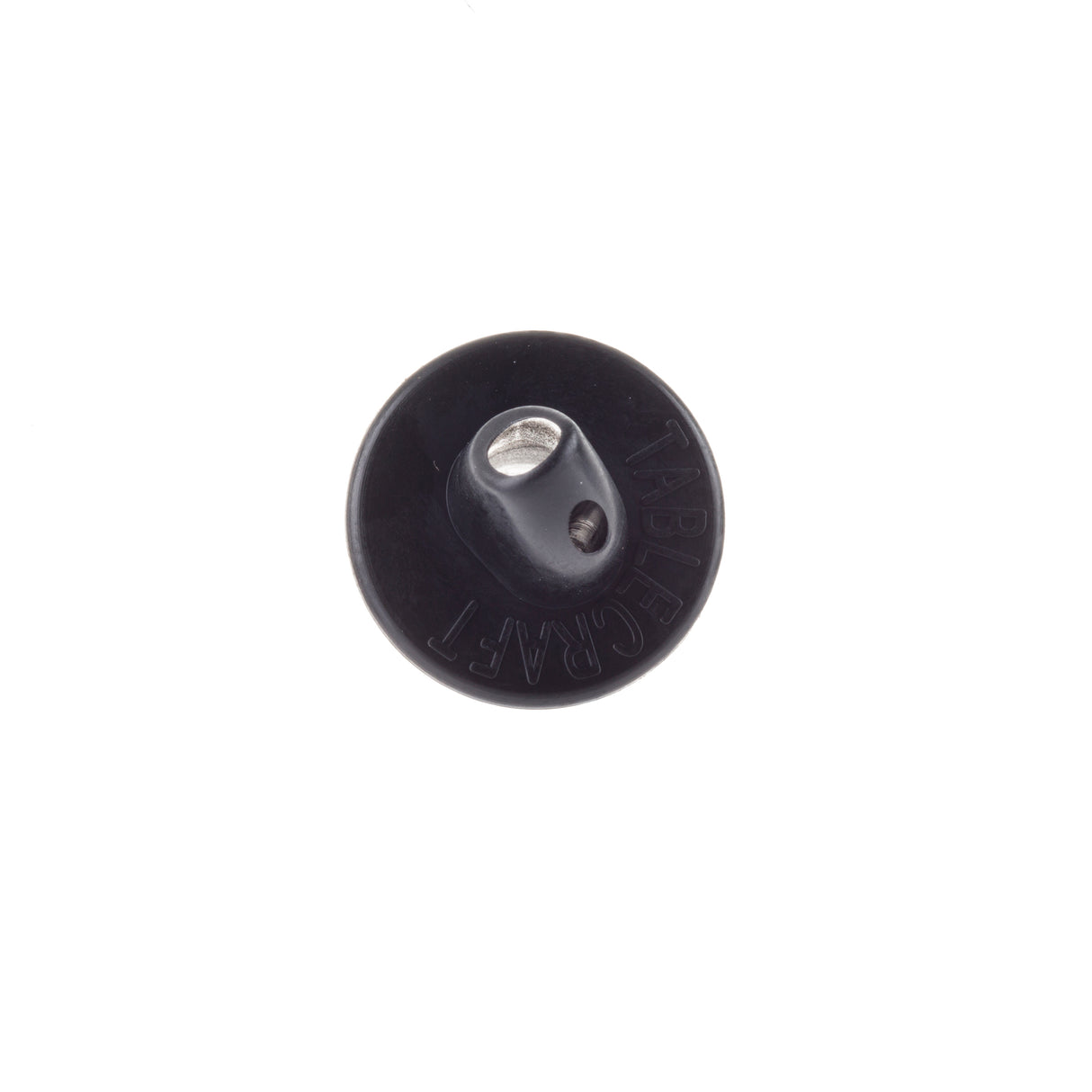 A round, black plastic tabletop TableCraft button with raised “TABLES CRAFT” lettering. It features a central, angled metal insert—similar to a free flow pourer—and a single hole for attachment. The background is plain white.