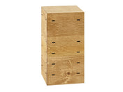 A tall, rectangular wooden box with three stacked sections, each resembling a drawer or compartment. Crafted from rustic pine, the wood grain is visible with small rectangular cutouts on the front and sides, typical of a Madera Crate Riser.