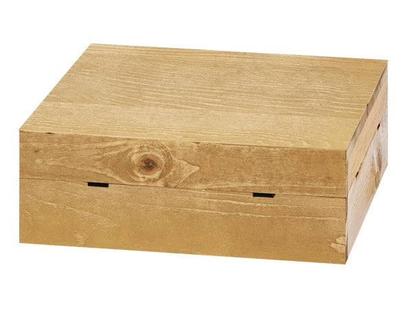 A rectangular, light-colored wooden box with a smooth finish and visible wood grain, this Cal-Mil Madera Crate Riser features rustic pine style and a hinged lid. The box is closed and plain, set against a white background.