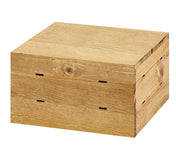 A rectangular Cal-Mil Madera Crate Riser with a rustic pine finish, featuring visible grain patterns and small rectangular ventilation slots on the front and side panels, sits on a plain white background.