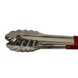 A close-up of stainless steel spring steel Tongs with scalloped edges and a red plastic-coated handle. The tongs, stamped with the NSF certification and TableCraft Products Co., are dishwasher safe. The background is plain white.