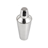 A shiny stainless steel bar shaker with a smooth, tapered body and a rounded, fitted lid stands upright on a white background. The surface reflects light, giving it a polished, modern appearance and it's dishwasher safe for easy cleaning.