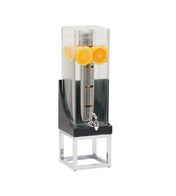 A clear, rectangular BPA Free beverage dispenser holds water with orange slices floating at the top. It stands on a silver and black metal base, featuring a spigot for drinks and a central infusion chamber likely filled with ice.