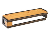 A rectangular shelf featuring a rustic pine surface with visible grain and knots, framed and supported by a black metal frame with open sides, combining a rustic and industrial style.