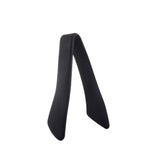 A black, V-shaped object with smooth, slightly curved sides, standing upright on a white background. This minimalist piece resembles a utensil rest and could pair perfectly with stainless steel tongs for a modern kitchen setup.