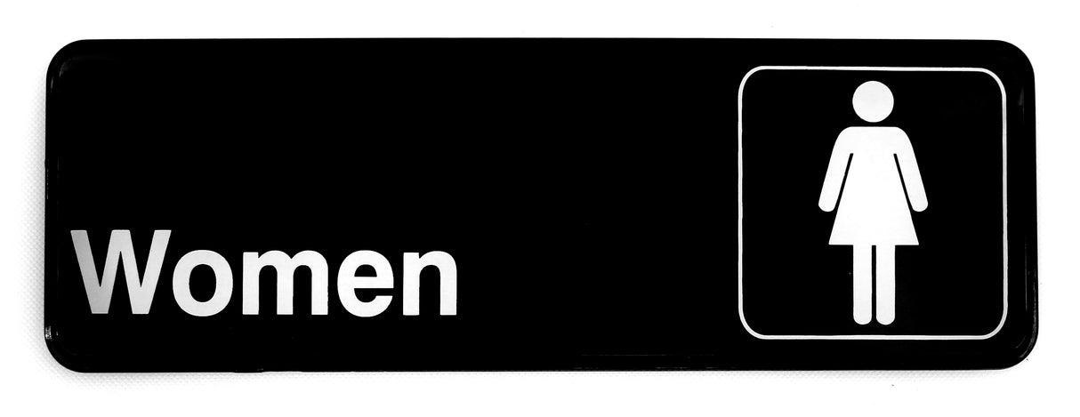 A black rectangular women sign with bold white "Women" text on the left and a white female stick figure inside a square outline on the right, designed as a cash and carry sign with pressure sensitive adhesive for easy restroom application.