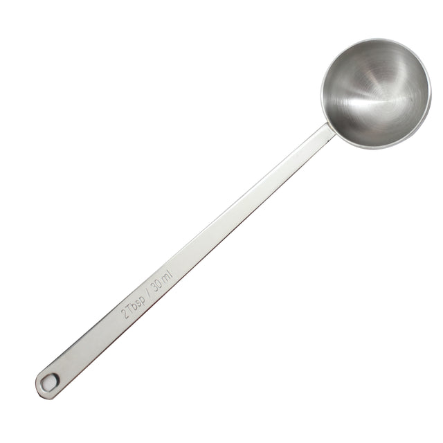 This long handled measuring spoon is crafted from durable stainless steel, featuring a round, deep bowl. The handle displays an engraving of 2 Tbsp / 30 ml and includes a small hole at the end for convenient hanging.