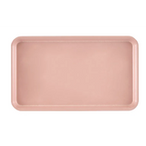 A rectangular Camtray with rounded corners is shown from above. Made of high-impact fiberglass, the solid light pink tray features a slightly raised rim and sits on a white background. Its smooth surface is unadorned and dishwasher safe.
