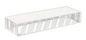 The Cal-Mil 4103-3-15 Portland Riser is a rectangular white wire shelf with an open geometric design, featuring angled metal rods and a solid flat top—ideal for organizing items on any countertop or desk.