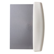 A dough scraper featuring a flat rectangular stainless steel blade and a thick, curved white plastic handle along one long edge. The dishwasher safe blade has a circular logo embossed in the center. The background is plain white.