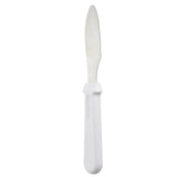 A TableCraft sandwich spreader with a stainless steel, slightly serrated blade and a thick, white plastic handle is shown on a white background. The handle has a groove for grip, and the knife is oriented vertically with the blade tip facing upward.