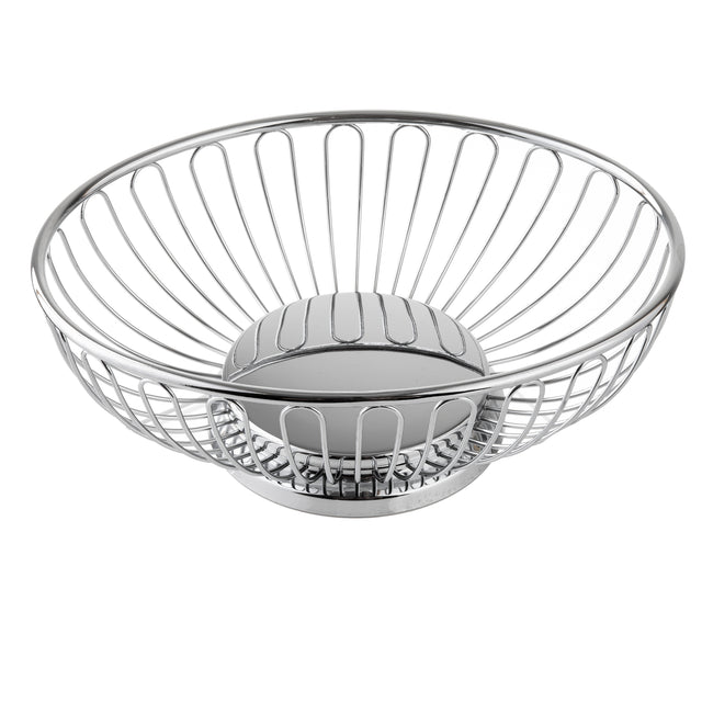 A round, chrome plated metal wire Chalet Basket with an open, airy design. The vertical rods connect the rim to a solid base, giving this TableCraft piece a modern and minimalist appearance. The background is plain white.