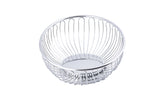 A round, silver metal wire chalet basket with an open design and curved vertical bars radiating from a solid circular base. This chrome plated TableCraft basket is empty and photographed against a plain white background.