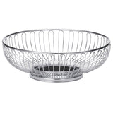 A round, chrome plated TableCraft Chalet Basket with an open, airy design. Featuring a circular base and vertical wires curving outward, this modern, minimalist basket sits empty on a white background.