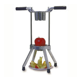 A metal Apple Hacker apple slicer with handles and four legs stands on a surface. A whole red apple is positioned under the blades, while sliced pieces are arranged on a plate beneath it. The background is plain white.