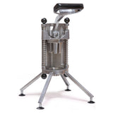 A metal French fry cutter with a black handle, cast aluminum cylindrical body, and four angled legs with suction cups for stability. The lever is raised, showing the grid blades inside where potatoes—or even apples—can be pushed through to make fries.