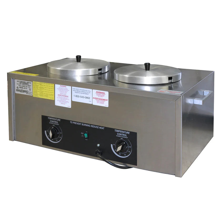 A stainless steel high output caramel warmer and double soup warmer with two covered round pots, black temperature control knobs, indicator lights, warning and instruction labels, and electrical cord, placed on a flat surface.