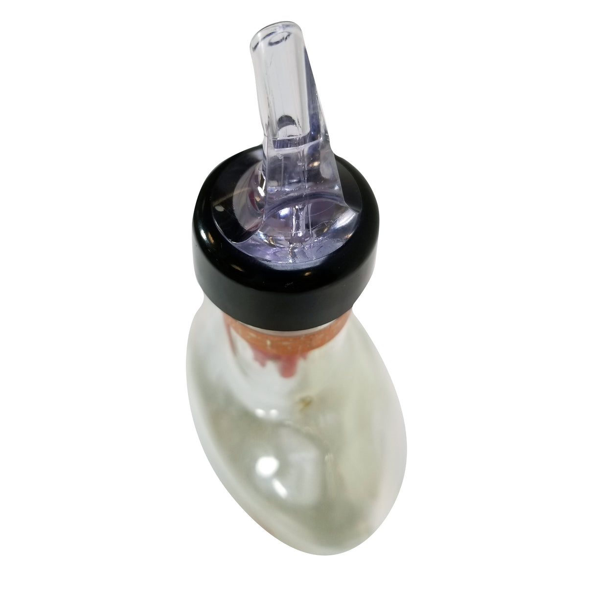 A clear, curved glass object with a narrow, angled spout and a black circular rim near the top, resembling a Proper Pour by TableCraft 1 oz. pourer, is photographed against a white background from an overhead angle.