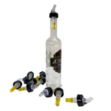 A clear 28M vodka bottle with a Proper Pour 1-1/2 oz. spout stands upright. Surrounding its base are eight black and yellow pour spouts scattered on a white surface. The bottle features a geometric pattern and black label, ideal for Cash & Carry shelves.