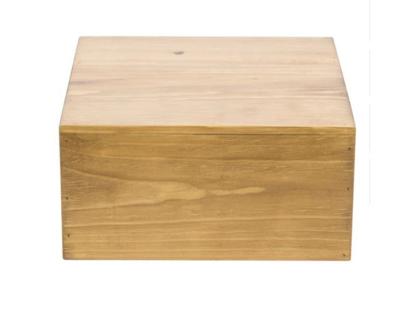 A plain, rectangular wooden box crafted from rustic pine, featuring smooth, light brown surfaces and visible wood grain. The box is closed, shown from a front angle against a white background, with no visible handles or decorations.