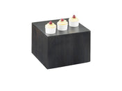 A dark wooden Cal-Mil display riser with three small white ramekins on top, each filled with custard and topped with a single red raspberry, set against a white background.