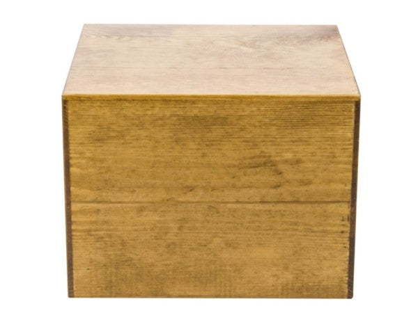 A plain, square Cal-Mil Madera Display Crate in light brown with visible wood grain, viewed from the front. The box has clean, smooth edges and a simple, unadorned design, standing against a white background.