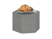 A small square plate holding two golden-brown scones with chocolate chips sits atop an Ashwood Riser with a visible wood grain texture, against a white background.