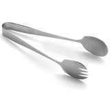 A stainless steel serving tong, dishwasher safe, features a spoon on one end and a three-pronged fork on the other, both ends gently curved; the utensil is displayed on a white background.