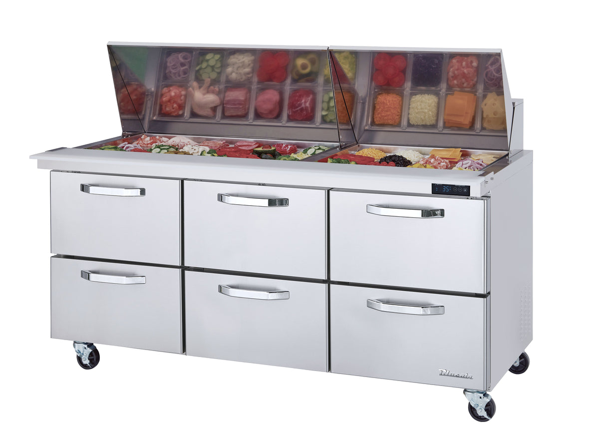 A commercial mega top refrigerated prep table with six drawers, a glass-covered top showcasing neatly arranged ingredients like vegetables, meats, cheese, and eggs, set on four caster wheels for mobility. A digital display is visible on the right side.