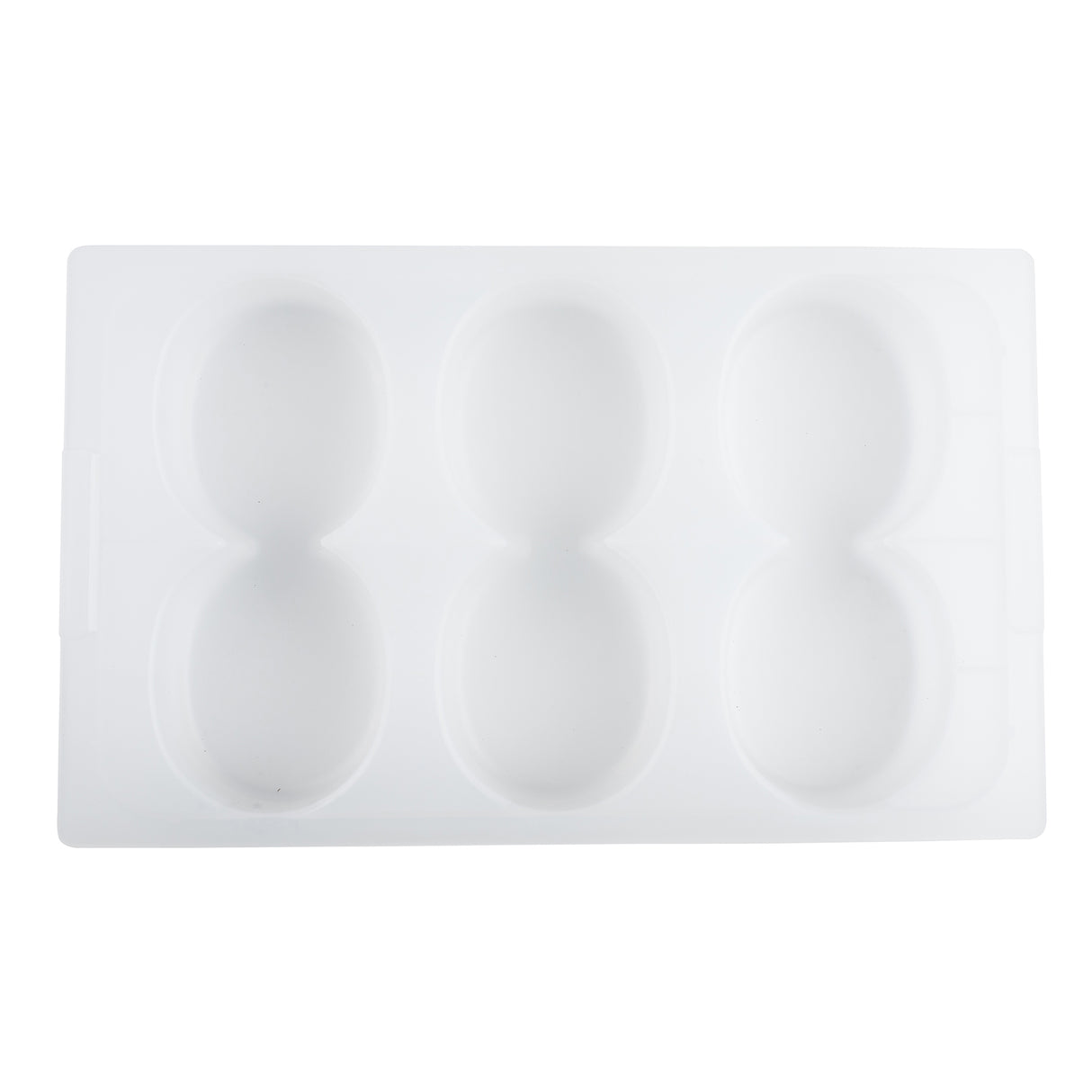 A white silicone mold by TableCraft Products with six oval-shaped cavities arranged in two rows of three, viewed from above. The mold features a smooth surface, rectangular edges, and is dishwasher safe for easy cleaning.