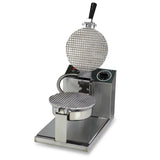 A stainless steel Giant Waffle Cone Baker with an 8" grid-patterned round plate is open to reveal both plates. It features a black handle, coiled cord, control knob, and indicator lights on a sleek rectangular base. The reflective surface looks pristine.