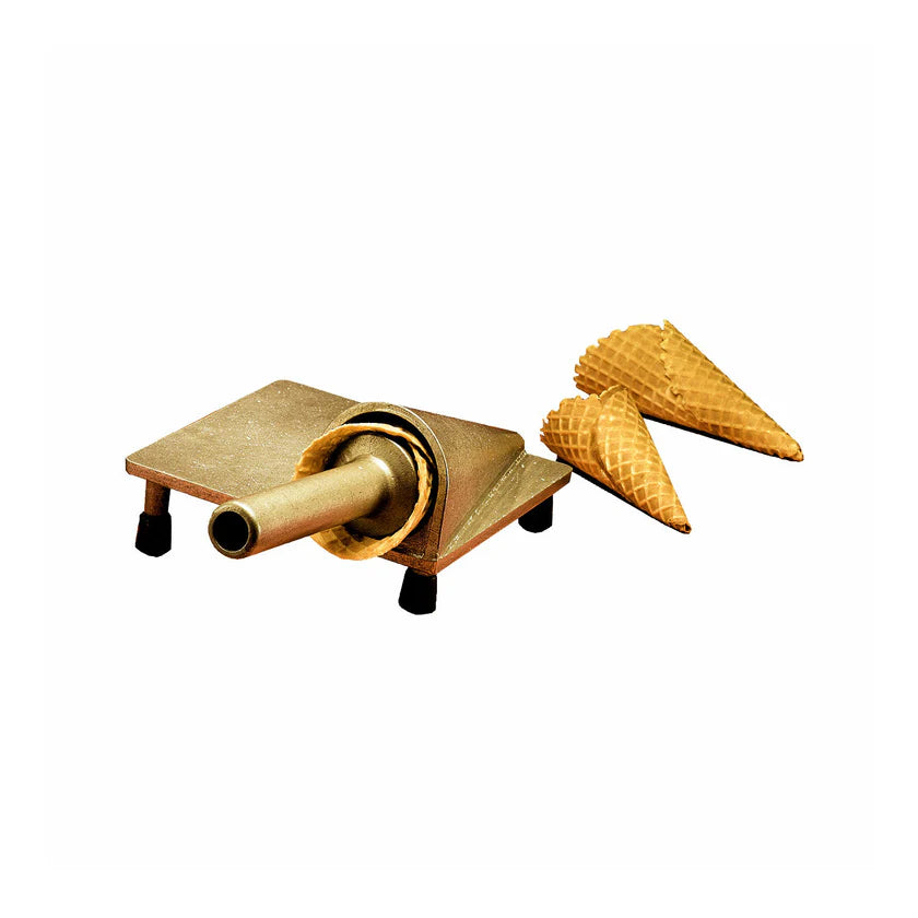 A cast aluminum mandrel Waffle Cone Roller with a flat base and cylindrical handle sits on four black legs. Two empty waffle cones rest beside it on a white background. The tool is used to shape and form perfect cone forms for delicious treats.