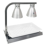 The Warma-Serve Food Warmer features two cone-shaped heat lamps above a rectangular white tray on a metal base, designed to keep food warm in commercial or buffet settings. The stainless steel food warmer includes ventilation holes and a caution sticker.