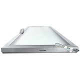 A rectangular metal-framed glass door lies flat, viewed from the bottom edge. The silver frame with a Door Left handle and visible wiring suggests it is an Empura Refrigeration appliance or equipment door, possibly for industrial use.