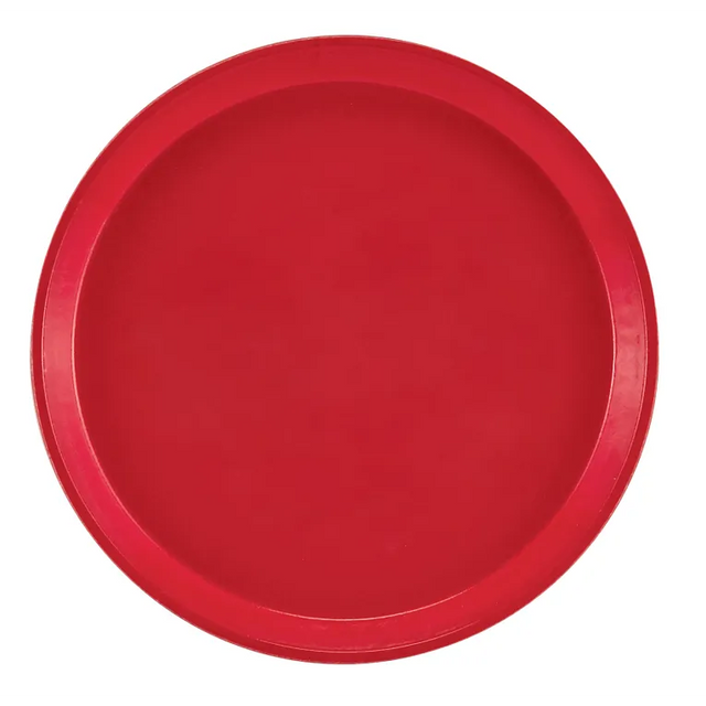 A plain, round red Serving Camtray with a slightly raised edge. This fiberglass tray has a smooth surface and is centered against a white background, featuring no patterns or visible textures, and is fully dishwasher safe.