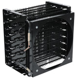 A close-up view of a black metal heat exchanger or radiator, featuring Empura Refrigeration condenser coil finned tubes and a large circular fan opening. Coiled metal pipes and a grid of thin metal fins enhance efficient heat dissipation.