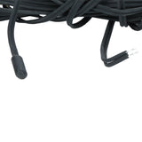 A close-up of a black electrical wire bundle, commonly used as an Empura Rome probe for Empura Refrigeration. One end features exposed metal prongs, while the other has a smooth, cylindrical black sensor. The wires are coiled against a plain white background.